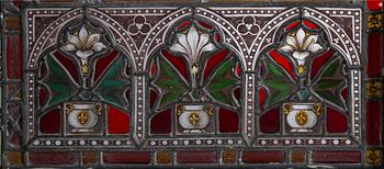 A stained glass window with St Theresa, late 19th Century.