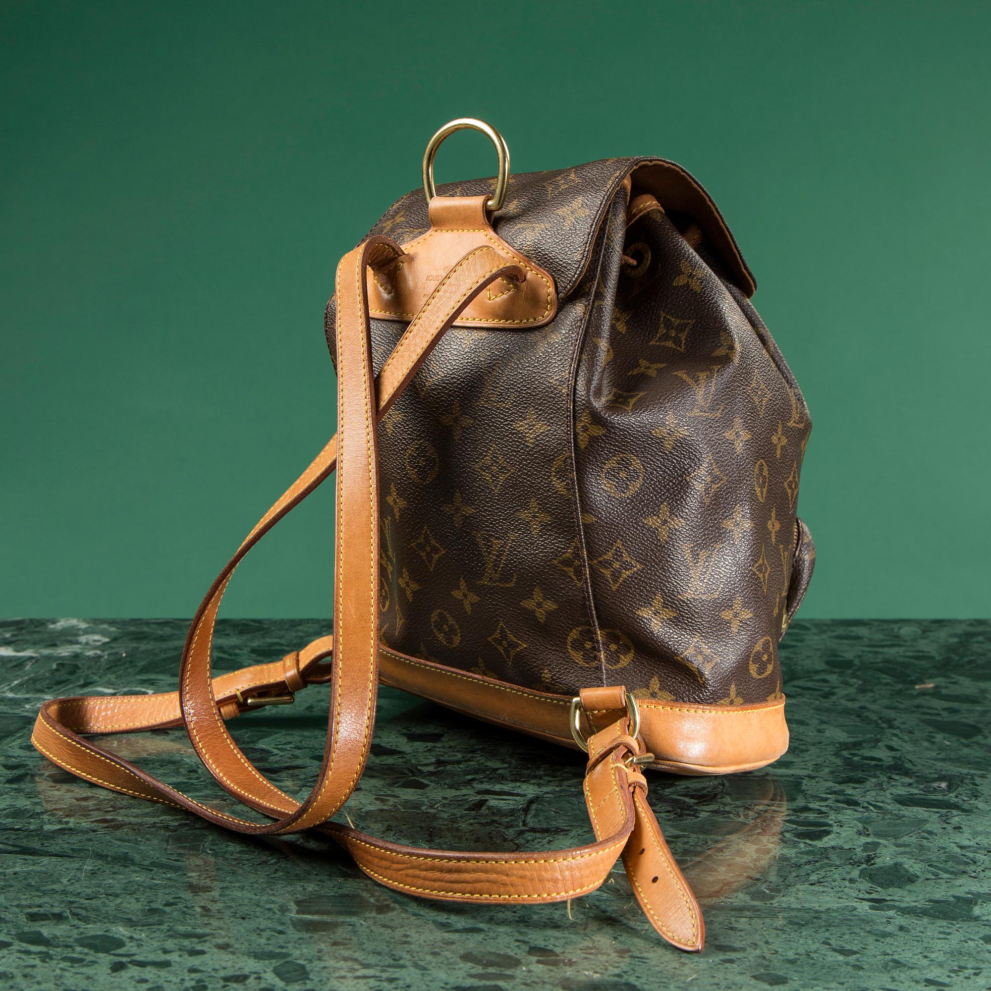 A BAG, "Mini Montsouris", by Louis Vuitton.