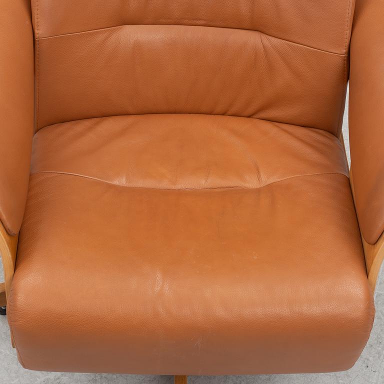 Helge Taraldsen, a 'Feel' armchair with a foot stool, Brunstad, Norway, 21st Century.