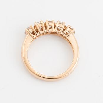Brilliant cut diamond five stone ring.