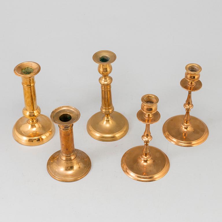 FIVE BRASS CANDLESTICKS, 19th/20th century.