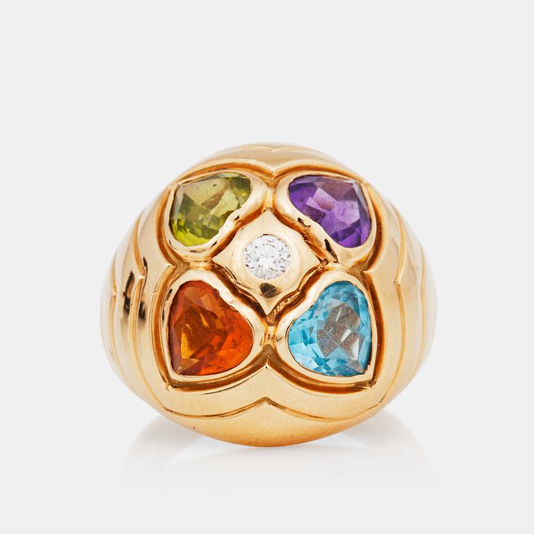 A Bulgari blue topaz, citrine, peridot, amethyst and circa 0.10 ct diamond ring.