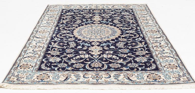 A Otiental carpet, c. 302 x 194 cm.