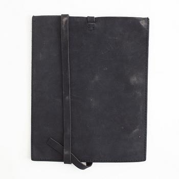 A pair of Uma Wang + Rigards, 'The Victorian', sunglasses and a Uma Wang, ipad case.