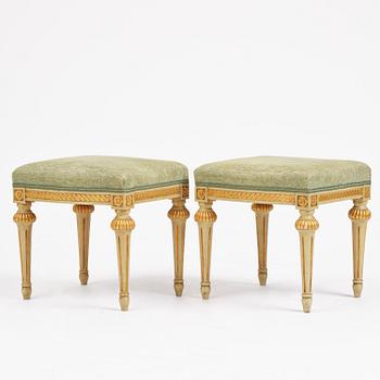 A pair of stools in the manner of Erik Öhrmark (master in Stockholm 1777–1813), Gustavian.