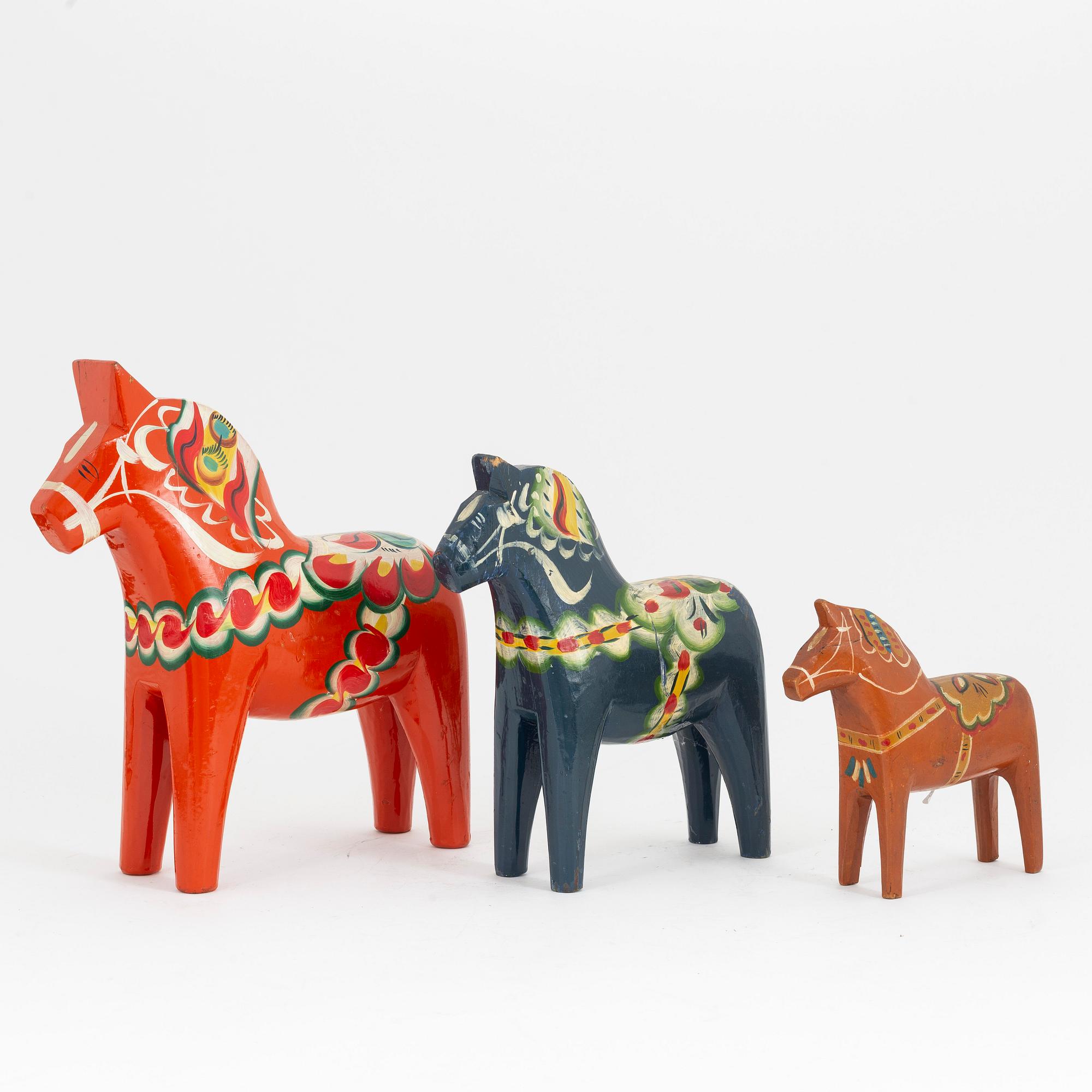 A set of three Dala horses, later part of the 20th Cenutry.