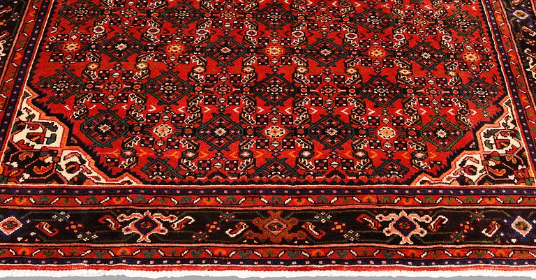 A Hosseinabad carpet,, ca 310 x 210 cm.