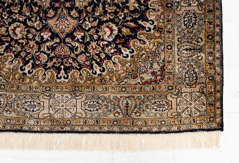 A Ghom, silk rug, c. 162 x 102 cm.
