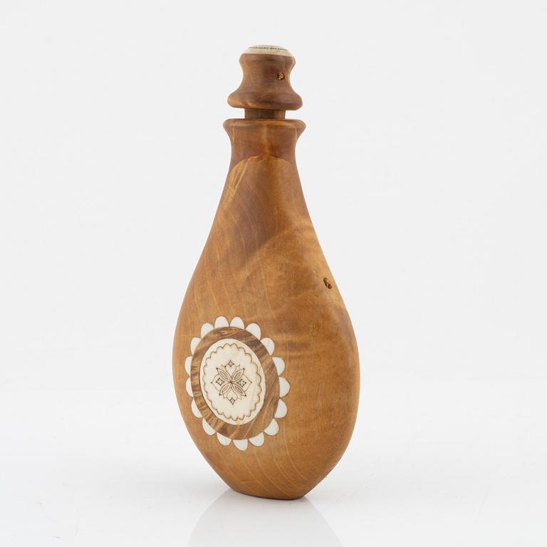 Anders Sunna, a birch and reindeer horn salt bottle, signed AS.