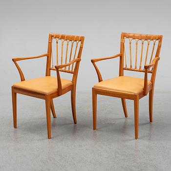 A pair of Josef Frank mahogany and rattan armchairs, Svenskt Tenn, Stockholm, Sweden.