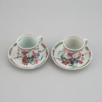 A pair of famille rose cups with dishes, Qing dynasty, Yongzheng (1723-35).