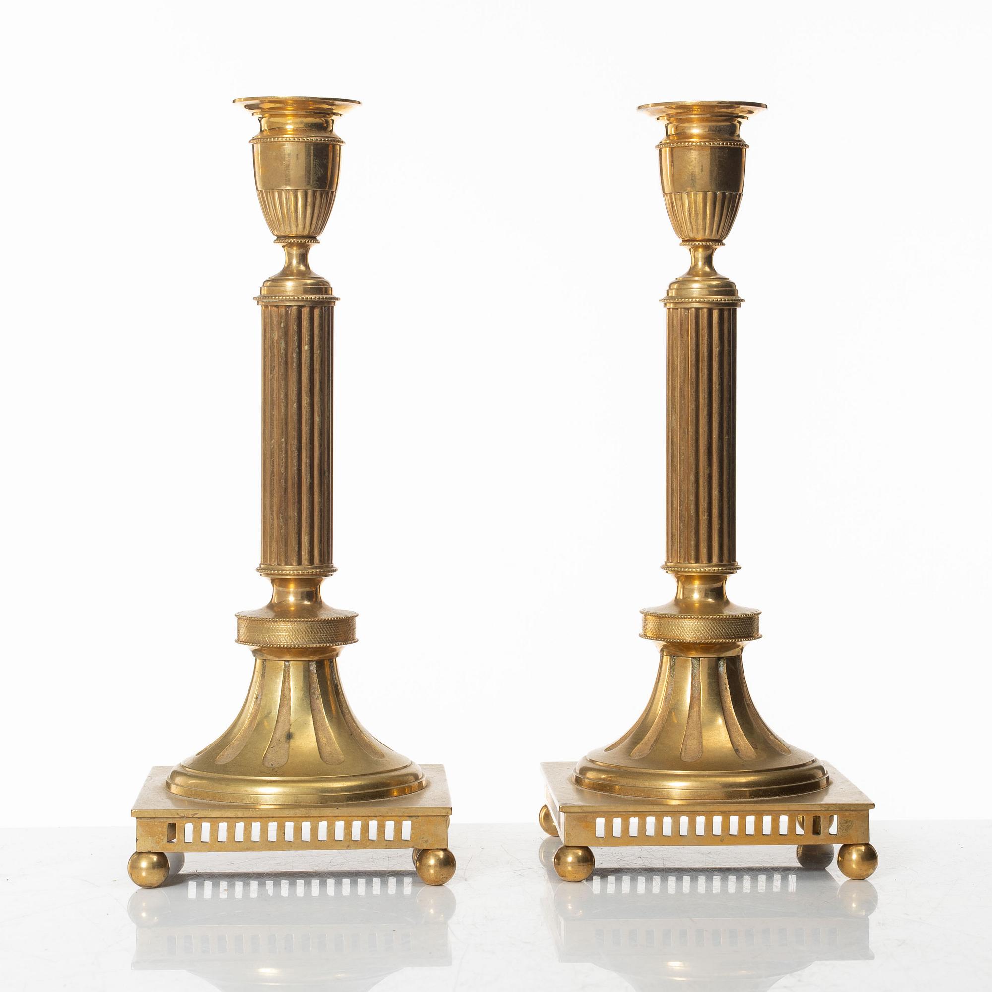 Ljusstakar, ett par, mässing, modell nr 71, Skultuna Messingsbruk, 1900-talets första hälft.