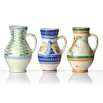 A group of seven European faiance and earthenware pitchers, partly France and Italy 19th century.