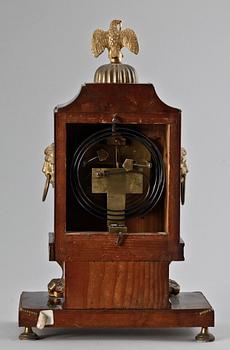 An Austrian Empire mantel clock.