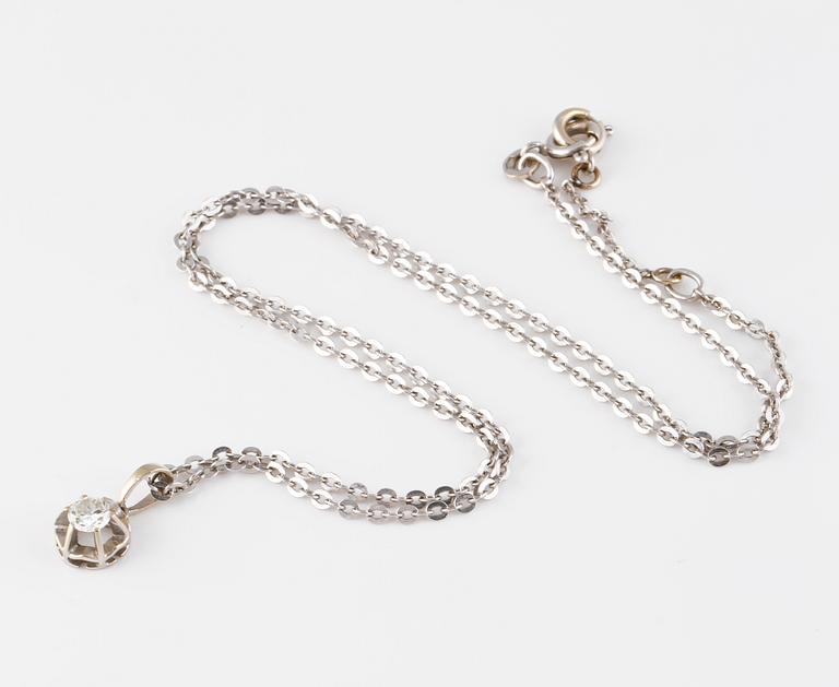 HÄNGE, 18K vitguld med briljantsliapd diamant ca 0.25 ct. Vikt 4,7 gram.