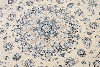 A Nain rug, diameter a. 247 cm.