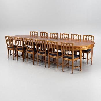 A Dining Table and Twelve Chairs, late Gustavian style, 20th Century.
