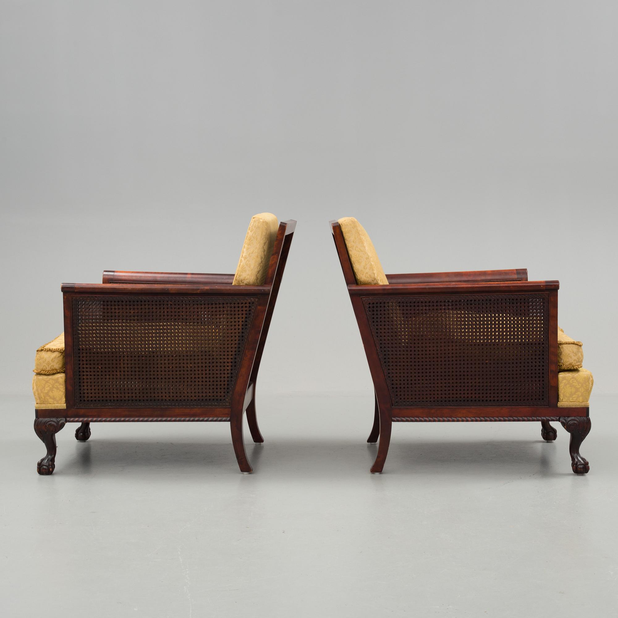 a pair of chippendale style armchairs from the 1930's/-40's.