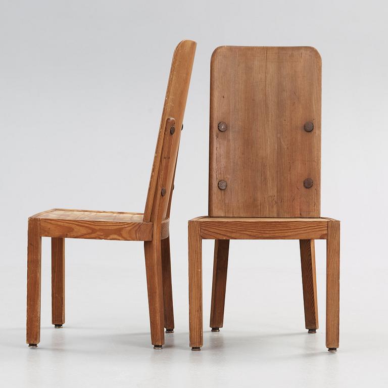 Axel Einar Hjorth, A pair of stained pine chairs, 'Lovö', Nordiska Kompaniet, Sweden 1930's.