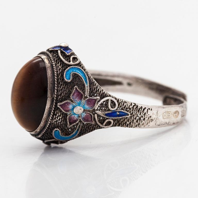 A jewelry set, bracelet, ring, and earrings, silver .916, enamel, and tiger's eye, Finnish import hallmarks 1956.