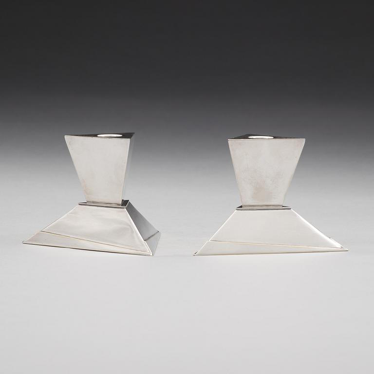 Elsa Tennhardt, A pair of Elsa Tennhardt silver plated candlesticks, E & J Bass Company, New York ca 1928.