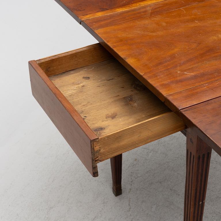 Table with drop leaves, 19th century.