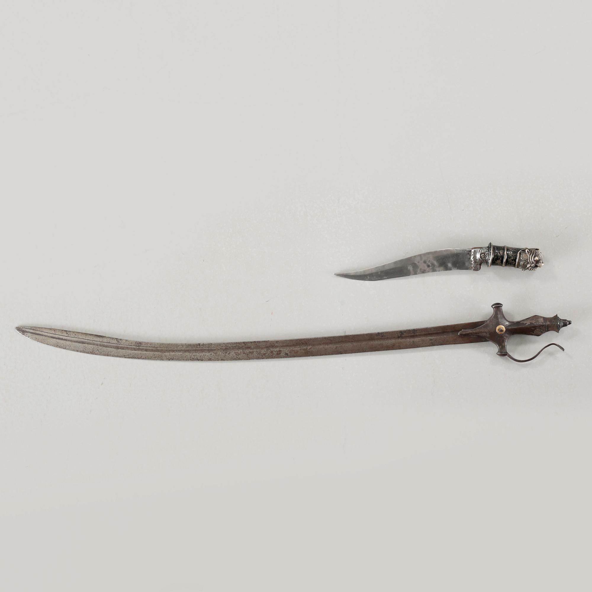 A tulwar and a knife from India, 19th century.
