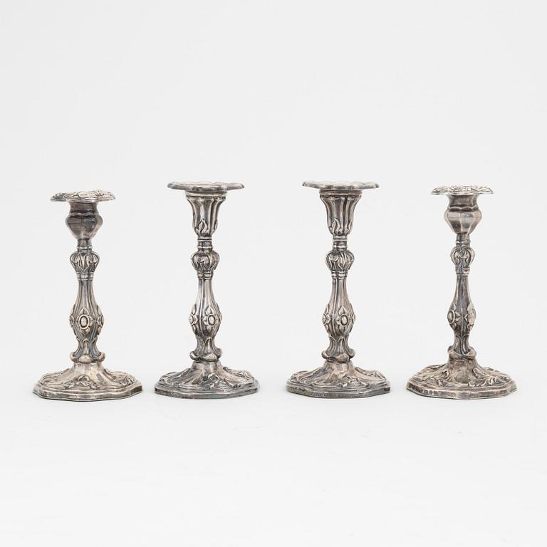 Two pairs of Swedish silver candlesticks, mark of A Lundqvist, Stockholm 1847 and JW Laurén, Stockholm 1854.