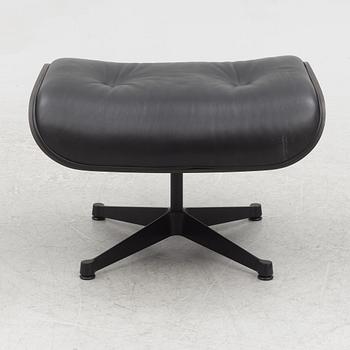 Charles & Ray Eames, an "Eames Lounge Chair" with ottoman, Vitra, 21st century.