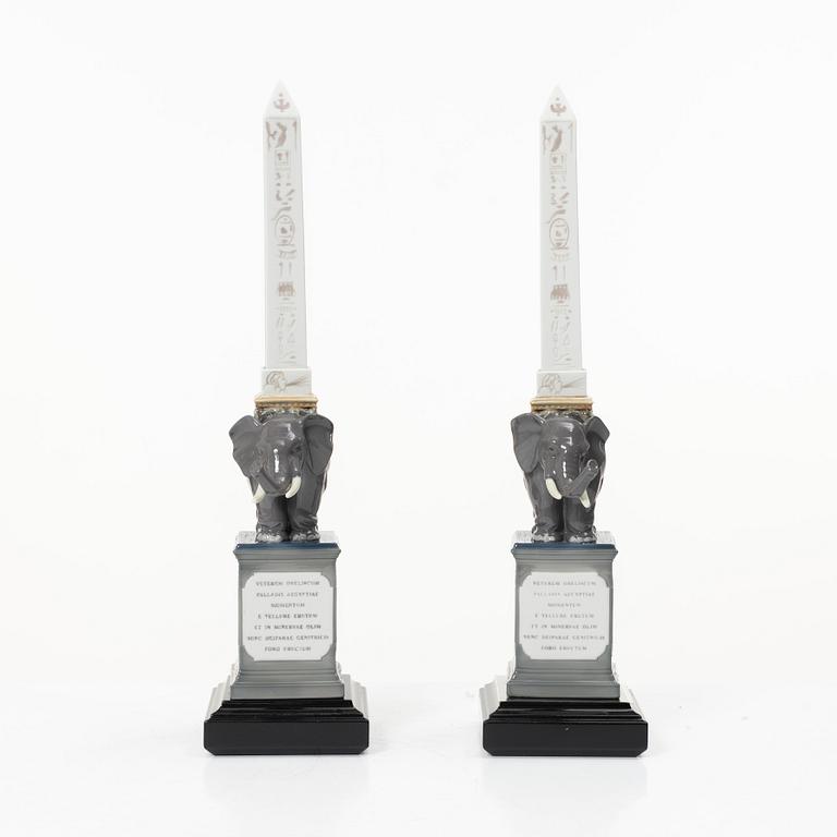 Lladró, figurines, a pair, "Pulcini obelisk enamels left" and "Pulcini obelisk enamels right", Spain.