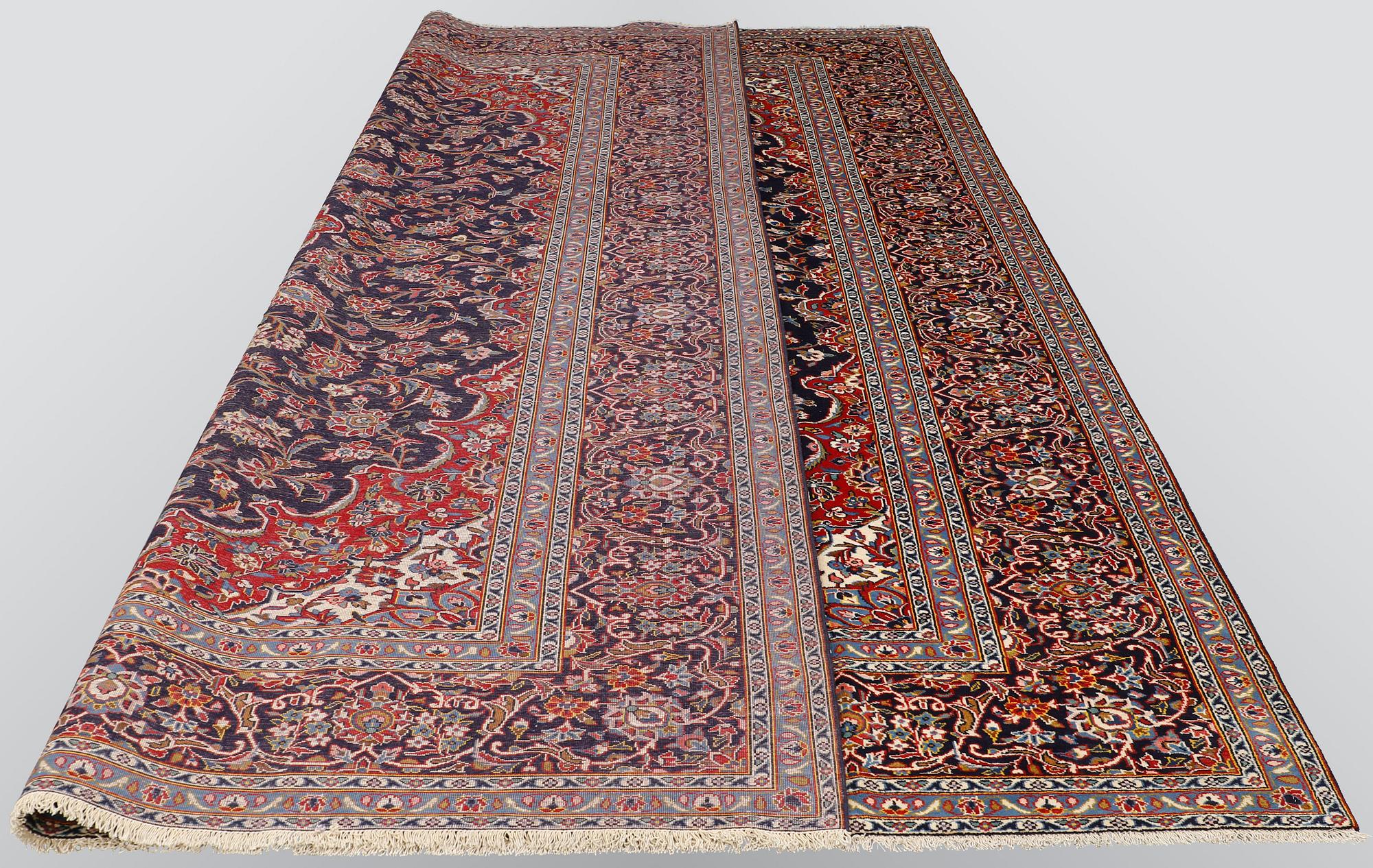 A carpet, Kashan, ca 424 x 304 cm.