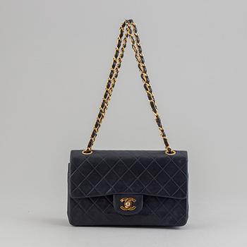 Chanel, a navy leather 'Double Flap Bag', 1989-91.