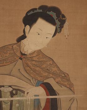 A hanging scroll of a lady and maid with a scaler, in the style of Qiu Ying (c 1494-1551) late Qing dynasty (1644-1912).