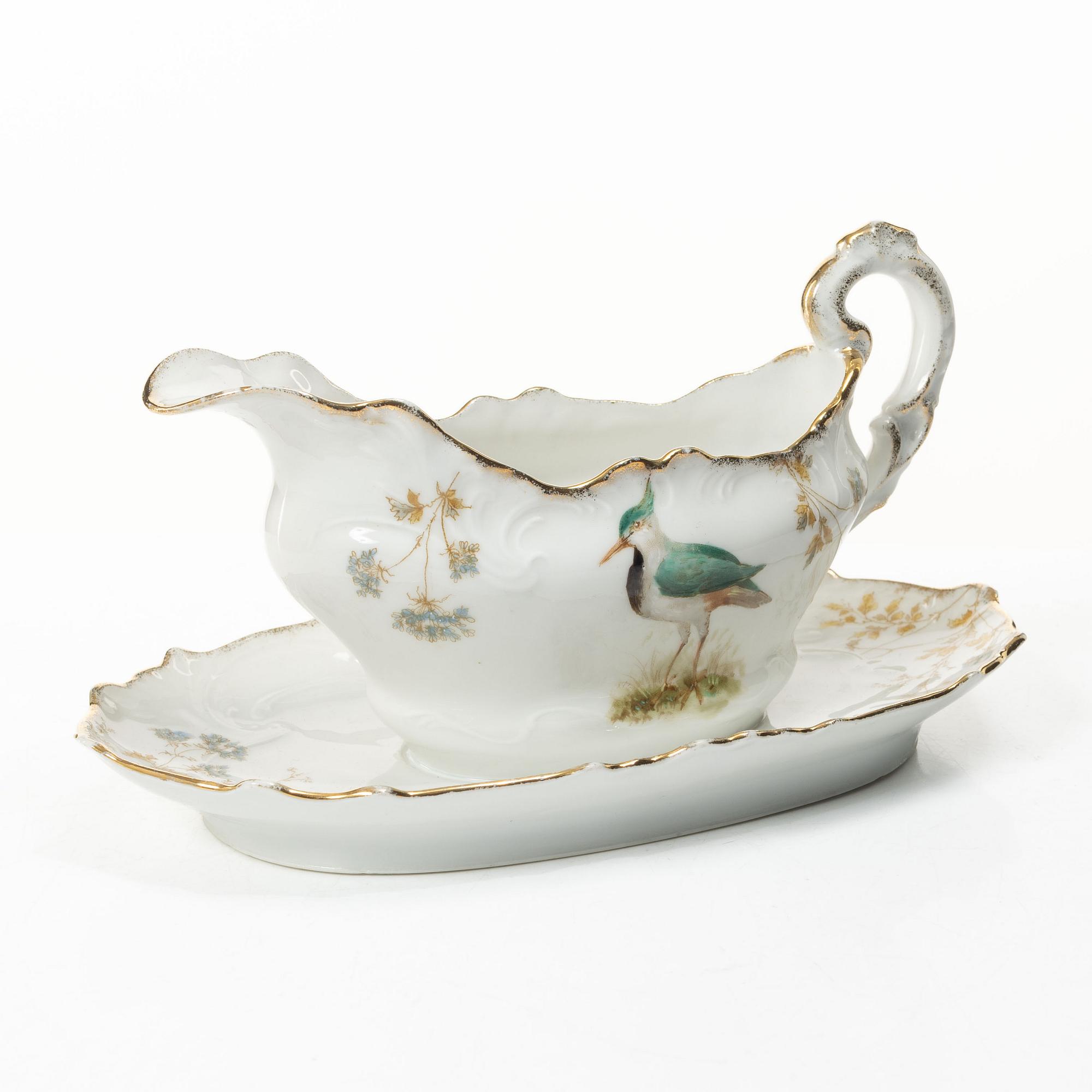 A 15 piece ‘birds’ porcelain dinner service, around 1900.