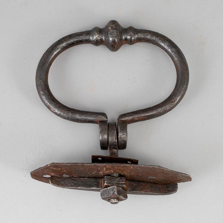 An 18th century cast iron door knocker.