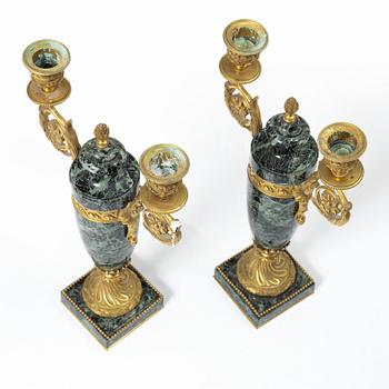 A pair of candelabras, around 1900.
