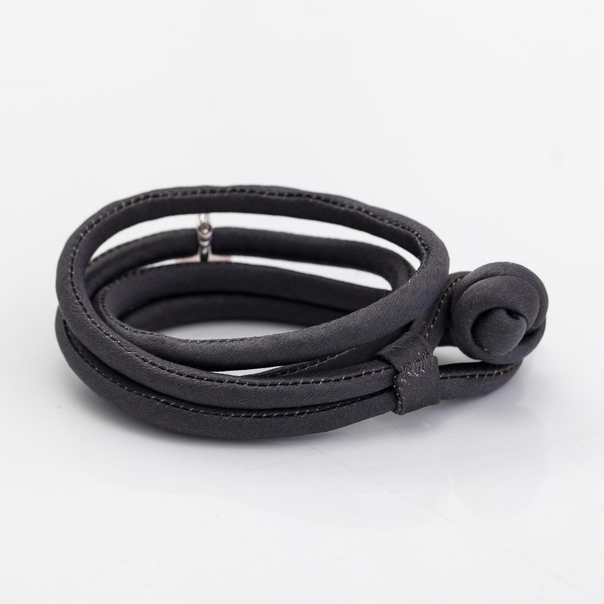 Ole Lynggaard, A silk, rose quartz, diamond 0.015 ct and 18K white gold bracelet. Denmark.