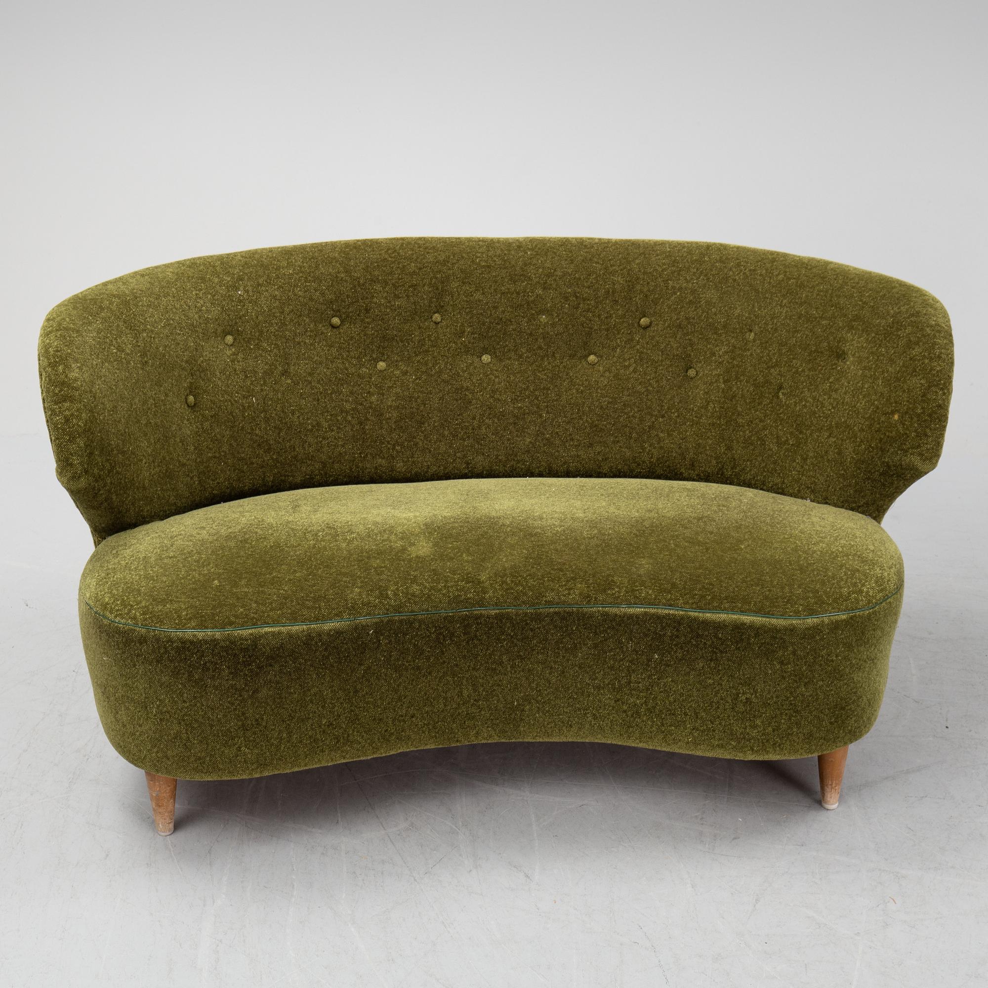 A sofa and easy chair, 1940s/50's.