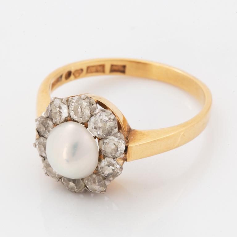 An old-cut diamond and pearl ring.