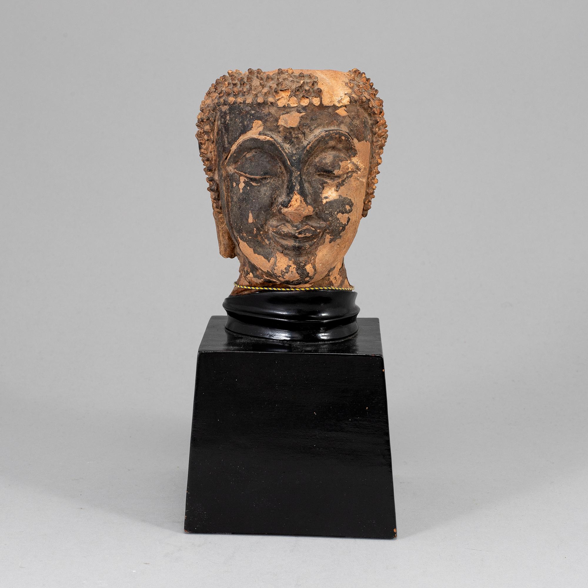 Scultpure of Buddhas head, probably Thailand, 19th Century.