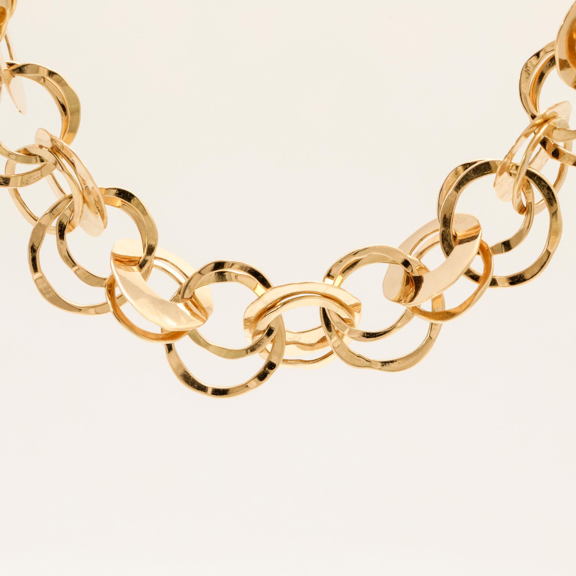 An 18K gold necklace by Cusi Italy.