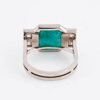 Rey Urban, an 18K white gold ring set with a step-cut emerald, Stockholm 1985.