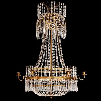 115. A late Gustavian gilt brass and cut glass seven-light chandelier, Stockholm, late 18th century.
