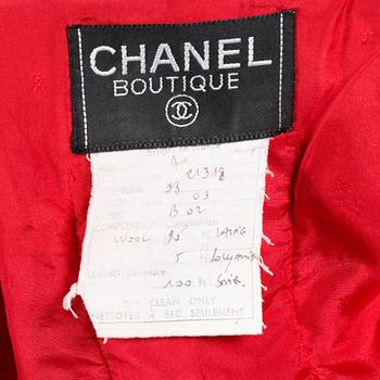 CHANEL, a red "Chanel bouclé" coat.