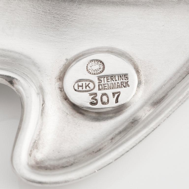 Henning Koppel, a sterling silver and dark brown enamel brooch, Georg Jensen, Copenhagen, Denmark, model 307.