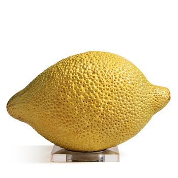89. Hans Hedberg, a large faience sculpture of a lemon, Biot, France, early 1990s.
