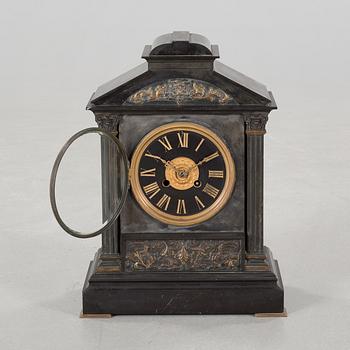 A 19th century mantle piece clock marked Swinden & sons.