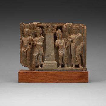 A schist relief with Buddha and attendants,
Gandhara, presumably 2nd/3rd century.