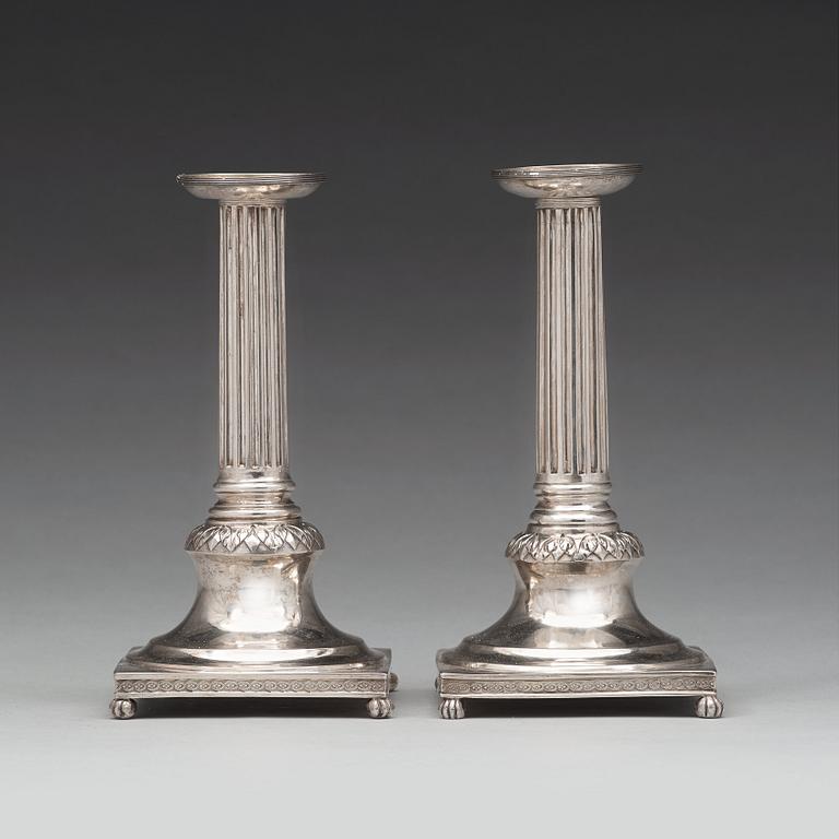 A pair of Swedish early 19th century silver candlesticks, mark of Anders Fornholm, Stockholm 1801.