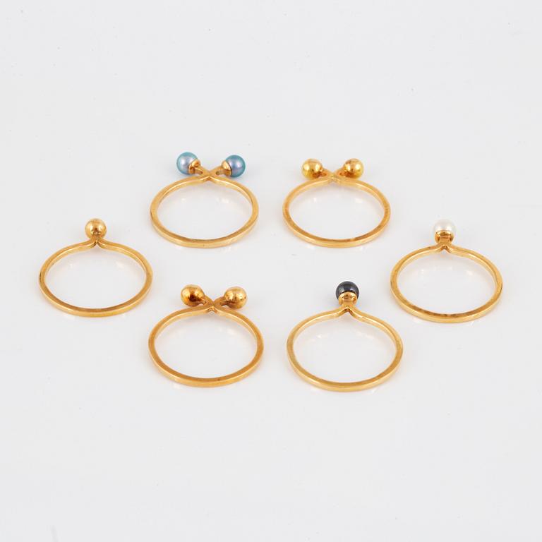 THERESIA HVORSLEV, six gold rings with cultured pearls.